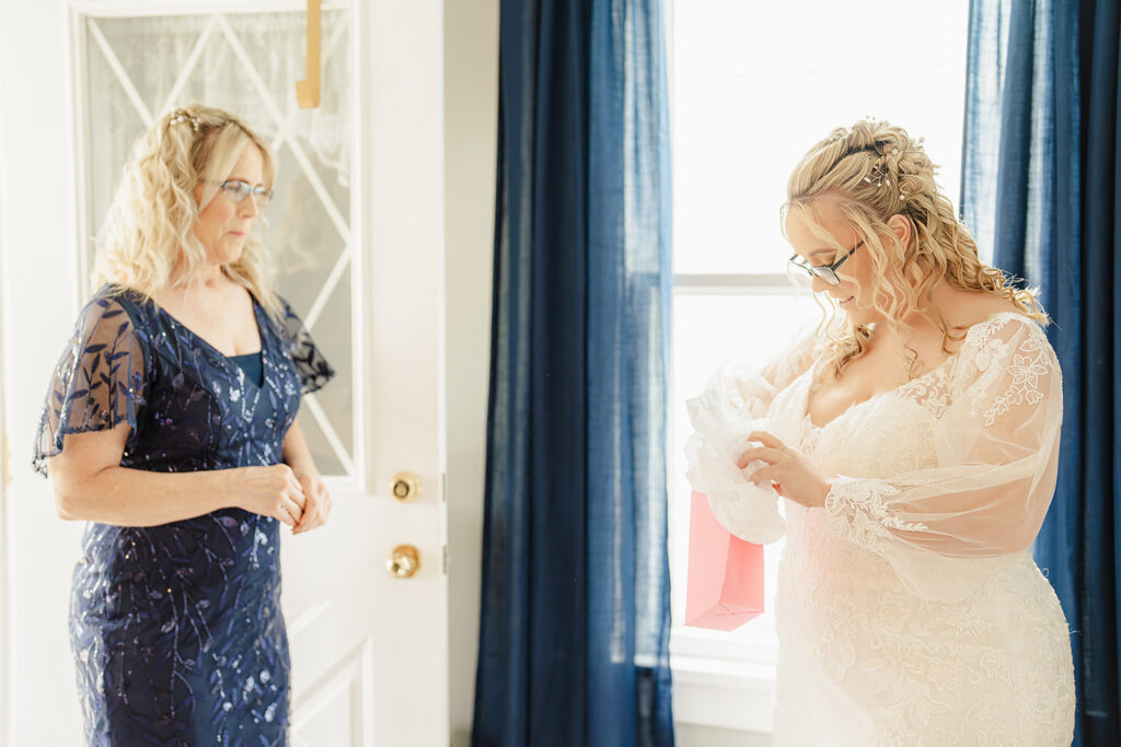 mother giving bride some new, old, borrowed, blue a wedding traditions