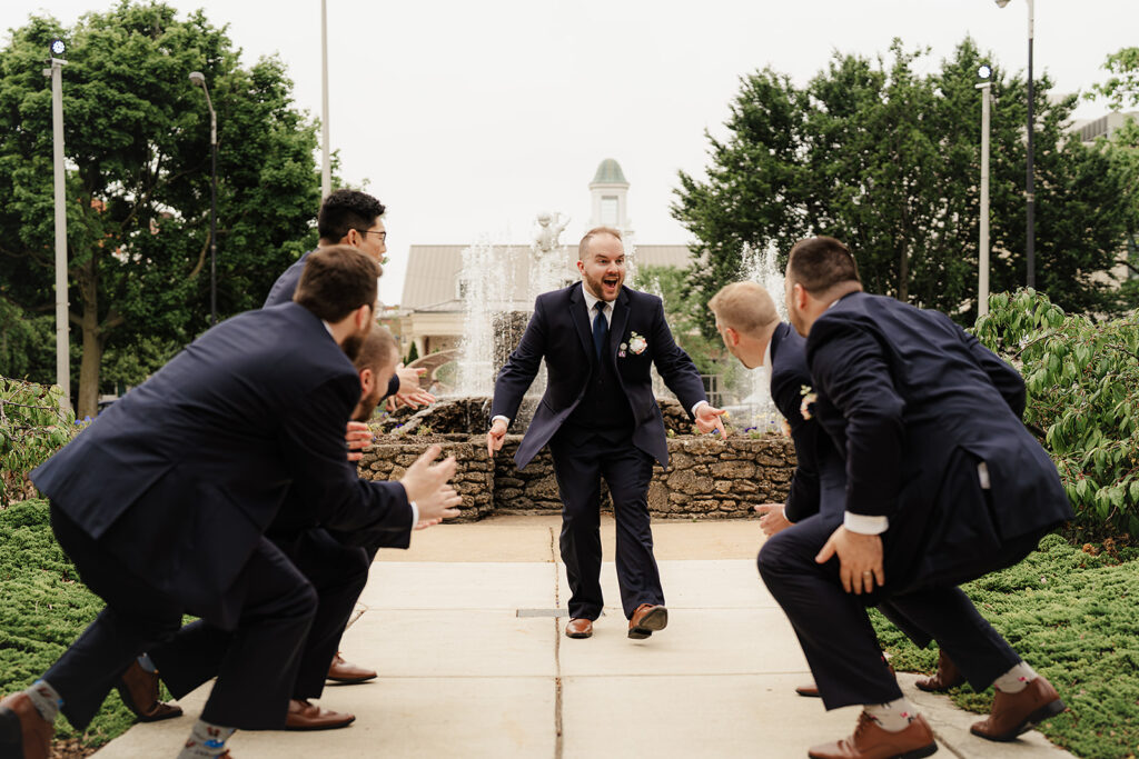 groomsman's hyping the groom group photo