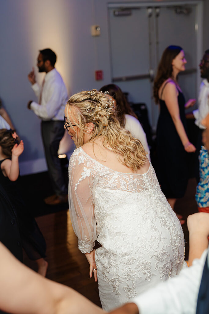 dance floor fun with bride at wedding 