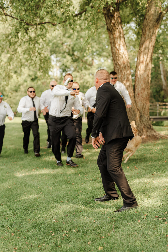 groomsman photo with dog