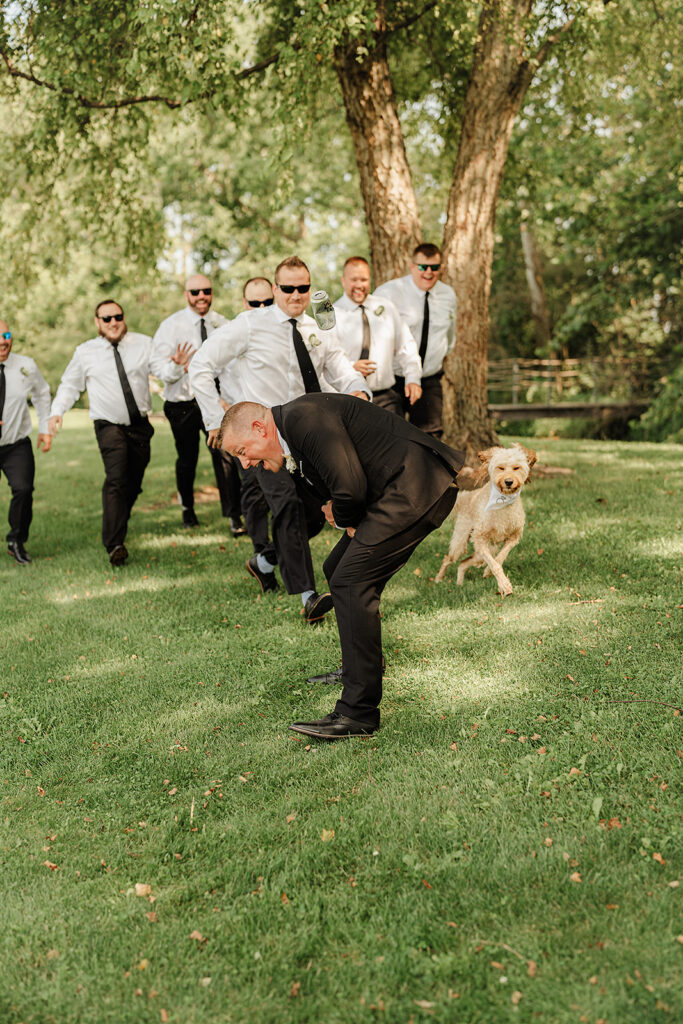 groomsman photo with dog