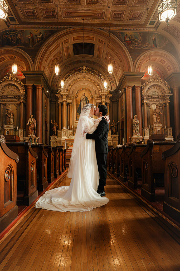 Portrait of bride and groom inside St. Mary's Catholic Church 