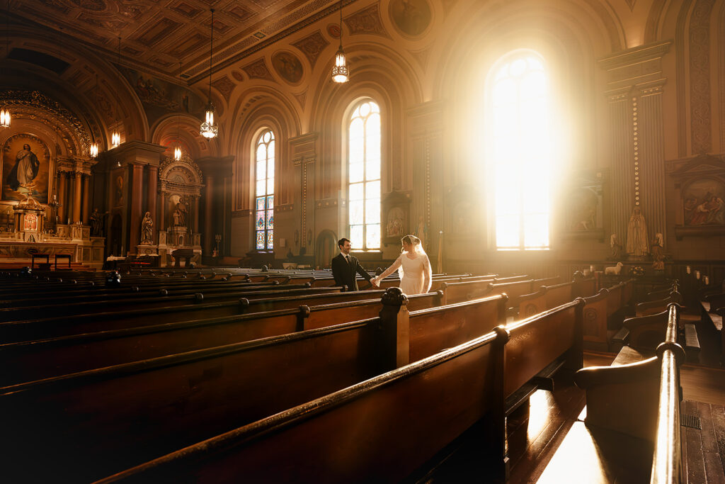 Portrait of bride and groom inside St. Mary's Catholic Church 
