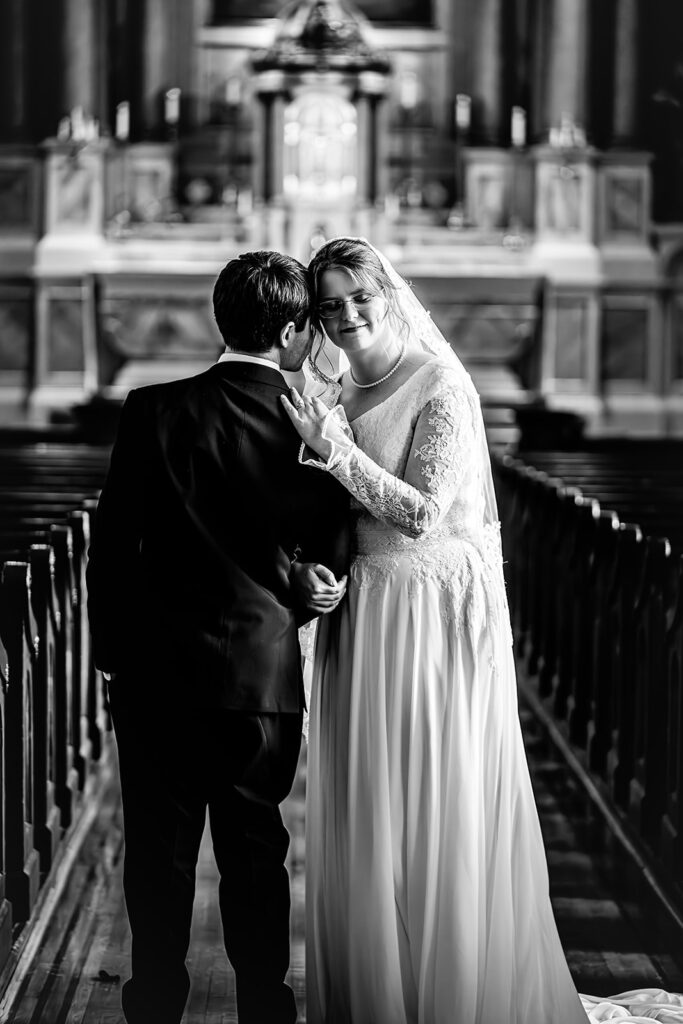Portrait of bride and groom inside St. Mary's Catholic Church 