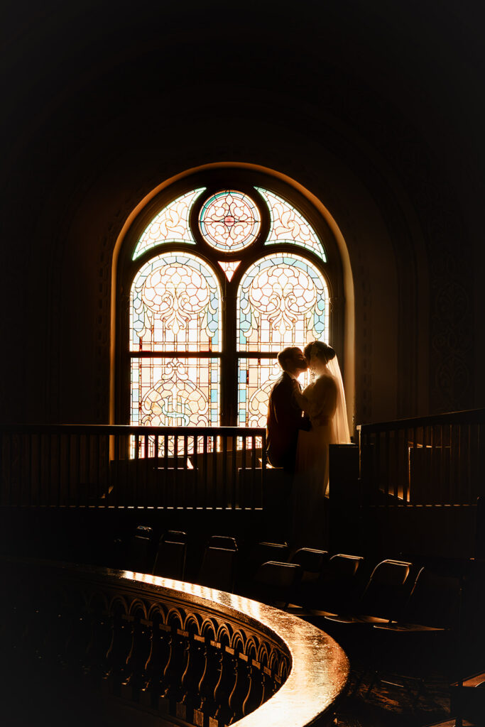 Portrait of bride and groom inside St. Mary's Catholic Church 