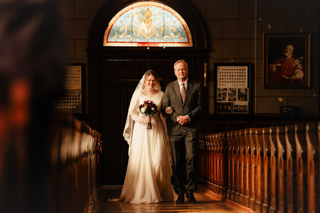 Bride and Father walking down the isle