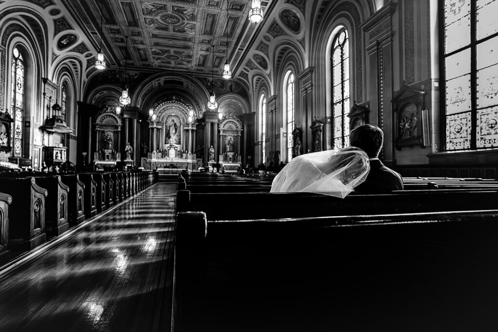 Portrait of bride and groom inside St. Mary's Catholic Church 