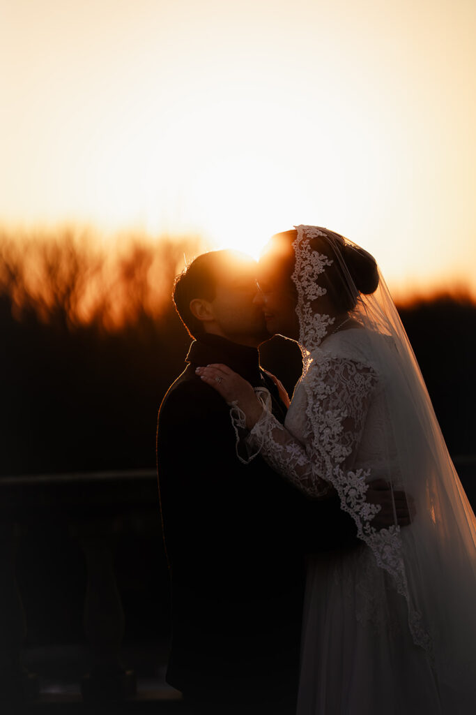 sunset portrait of bride and groom