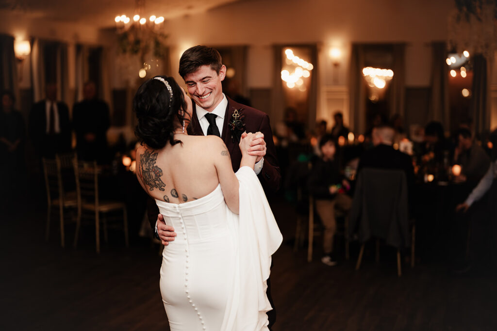 portrait of bride and grooms first dance